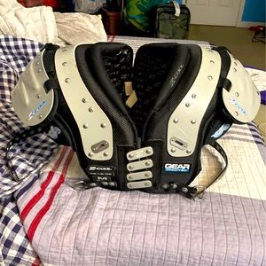 Slightly worn. Slight scuff and bend in metal straps